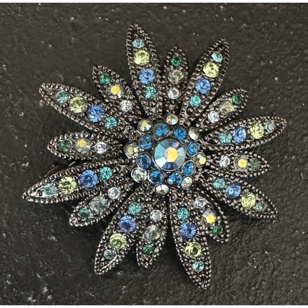 JOAN RIVERS SWAROVSKI DAISY BLACK METAL BROOCH/PIN SIGNED BLUE GREEN 1.5”